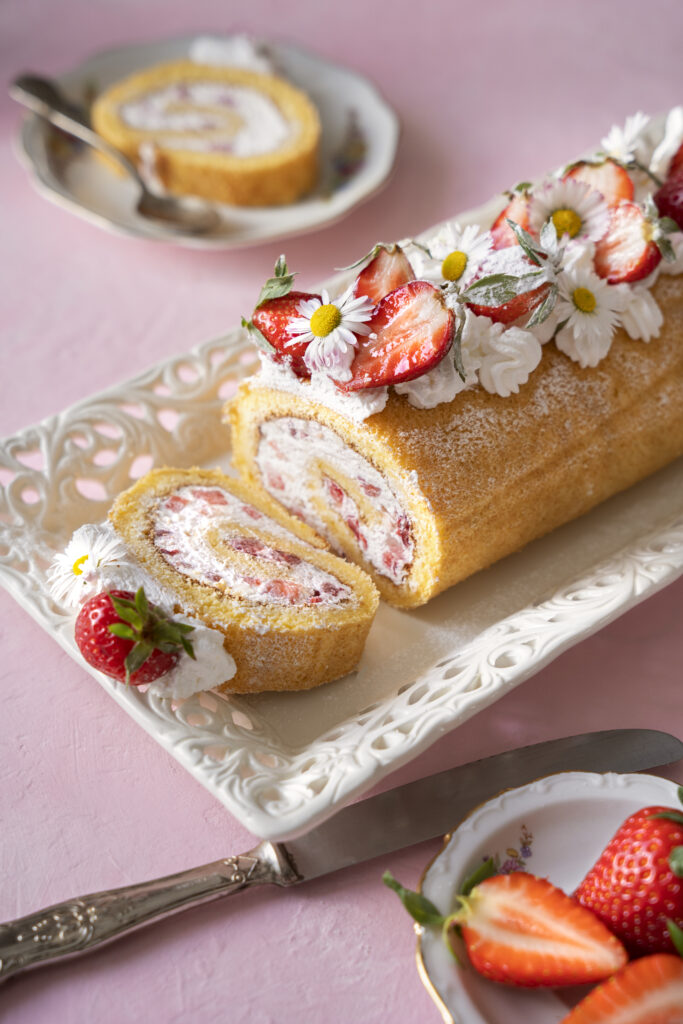 Brazo con nata y fresa